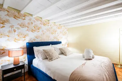 Letto o letti in una camera di Da Vinci Living Apartment a 10 minuti a piedi dal David