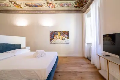 Letto o letti in una camera di Residenza d'Epoca Palazzo Salviati Quaratesi