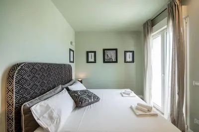 Letto o letti in una camera di Penthouse with Terrace over Florence