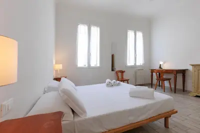 Letto o letti in una camera di Serragli Deluxe Apartment