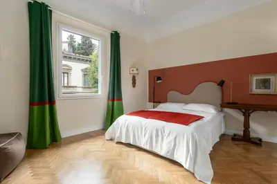 Letto o letti in una camera di EggPrint Florence