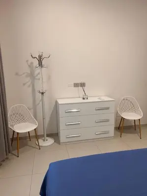 Letto o letti in una camera di Appartamento firenze