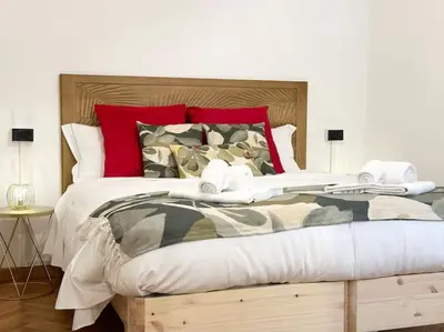 Letto o letti in una camera di GOLDEN LUXE - Cappelle Medicee 2 private suites