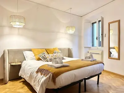 Letto o letti in una camera di GOLDEN LUXE - Cappelle Medicee 2 private suites