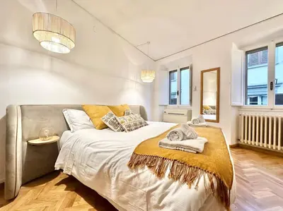 Letto o letti in una camera di GOLDEN LUXE - Cappelle Medicee 2 private suites