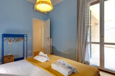 Letto o letti in una camera di Marsilio Ficino Apartment by Mamo Florence