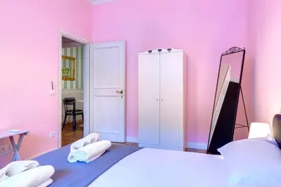 Letto o letti in una camera di Marsilio Ficino Apartment by Mamo Florence