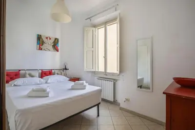 Letto o letti in una camera di Angelico Urban Loft
