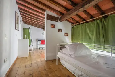 Letto o letti in una camera di Angelico Urban Loft
