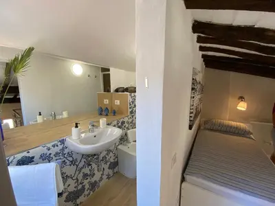 Letto o letti in una camera di Alla Porta di San Frediano