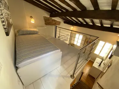 Letto o letti in una camera di Alla Porta di San Frediano