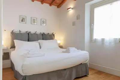 Letto o letti in una camera di Novella Cozy House