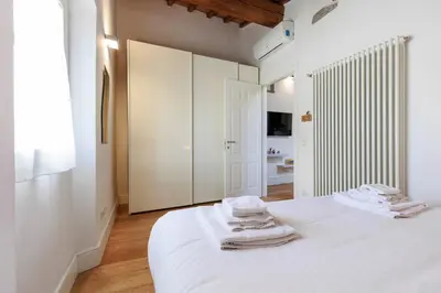 Letto o letti in una camera di Novella Cozy House