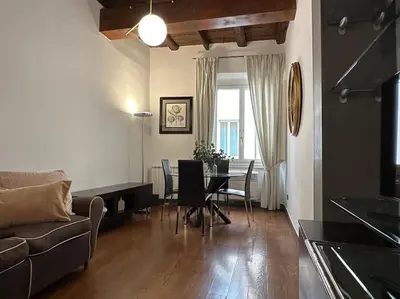 Area soggiorno di Romantico appartamento con vista su ponte vecchio