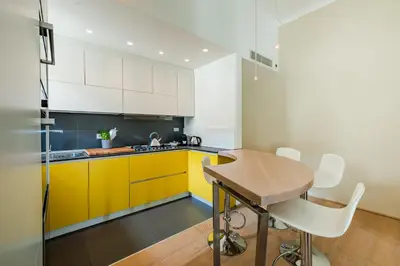 Cucina o angolo cottura di Quiet Designer Flat with Private Rooftop Terrace
