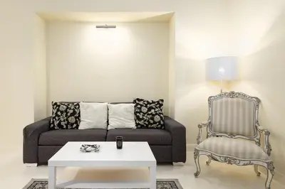 Area soggiorno di UNYCA - Florence Elegant Residence