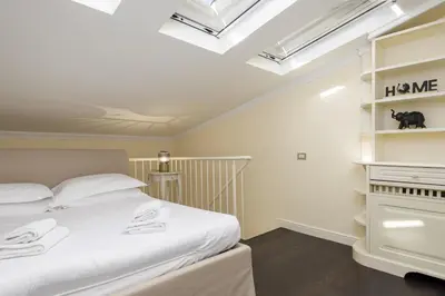 Letto o letti in una camera di UNYCA - Florence Elegant Residence