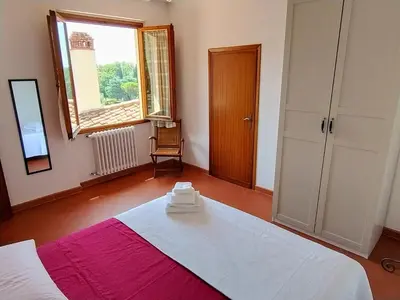 Letto o letti in una camera di Il Gigaro