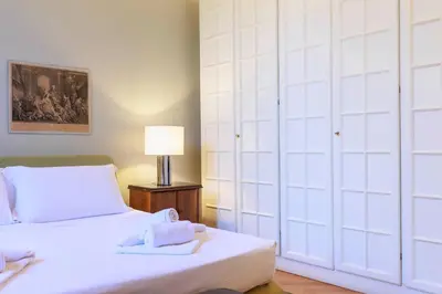 Letto o letti in una camera di Florence Huge Apartment with Private Garden