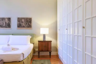 Letto o letti in una camera di Florence Huge Apartment with Private Garden