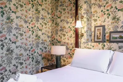 Letto o letti in una camera di Florence Huge Apartment with Private Garden