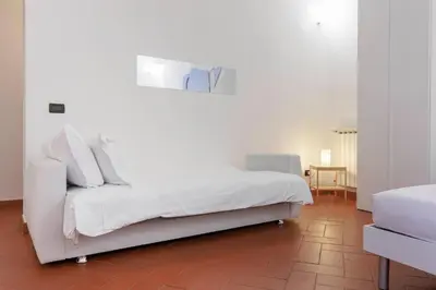 Letto o letti in una camera di Santa Croce Nest