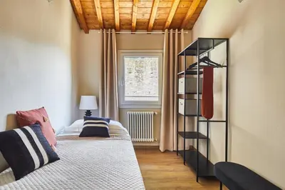 Letto o letti in una camera di Casa Camillo