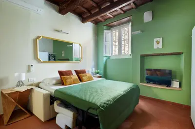 Letto o letti in una camera di Casa Hugo