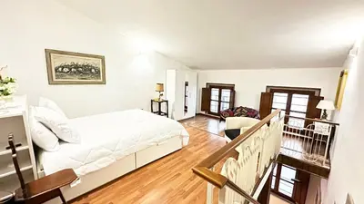 Letto o letti in una camera di Davanti al Duomo-Appartamento Storico