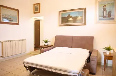 Area soggiorno di Santo Spirito Terrace Apartment with a view