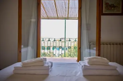 Letto o letti in una camera di Santo Spirito Terrace Apartment with a view