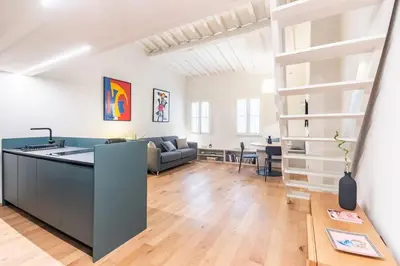 Area soggiorno di B-suite Florence