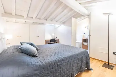 Letto o letti in una camera di B-suite Florence