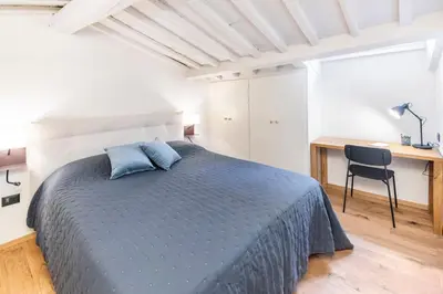 Letto o letti in una camera di B-suite Florence