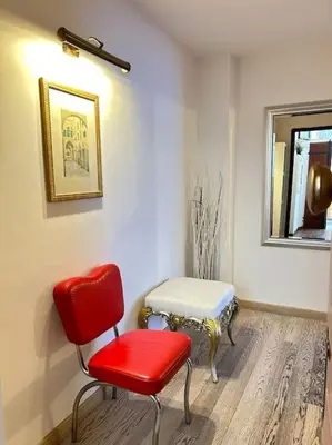 Area soggiorno di L'insolita 28 by FlorenceHospitality com