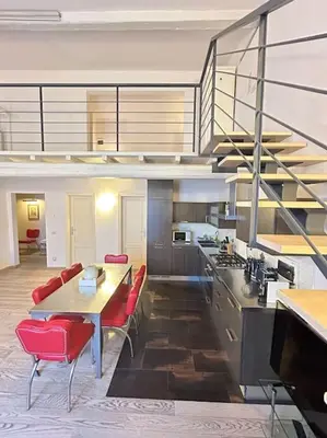 Area soggiorno di L'insolita 28 by FlorenceHospitality com