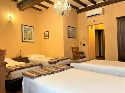 Letto o letti in una camera di Residence La Contessina