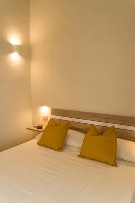 Letto o letti in una camera di La Nicchia di Niccolò