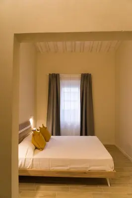 Letto o letti in una camera di La Nicchia di Niccolò