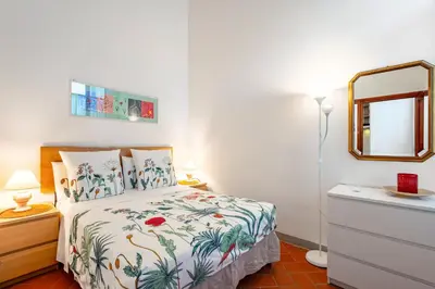 Letto o letti in una camera di GuestHost - Terzolle - Rifredi & Piazza Dalmazia Apartment