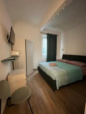 Letto o letti in una camera di Flat in centro storico La casa di Luna