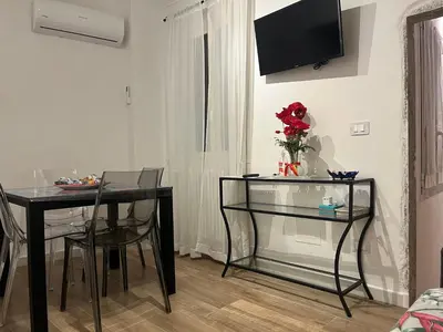 TV o dispositivi per l'intrattenimento presso Flat in centro storico La casa di Luna