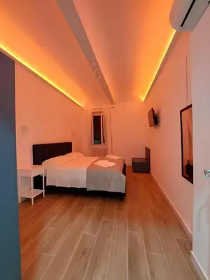 Letto o letti in una camera di Flat in centro storico La casa di Luna
