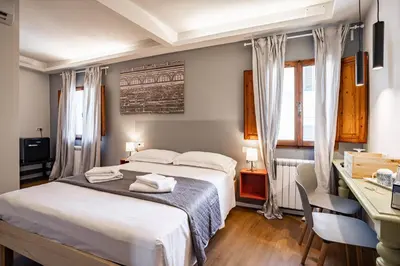 Letto o letti in una camera di GuestHost - Pisana 236 Suites