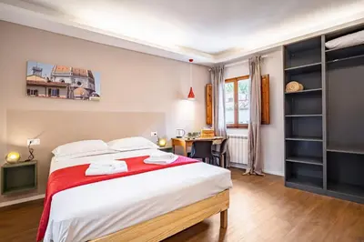 Letto o letti in una camera di GuestHost - Pisana 236 Suites