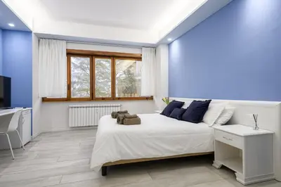 Letto o letti in una camera di Sogna Firenze apartments