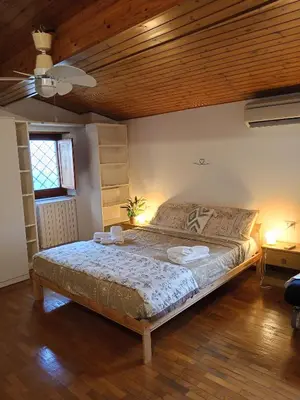 Letto o letti in una camera di Casa romantica vicino al centro di Firenze