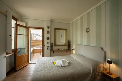 Letto o letti in una camera di Casa Sofia Santo Spirito
