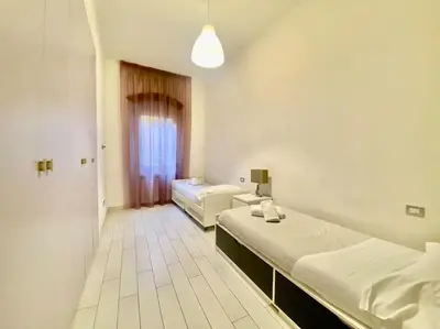 Letto o letti in una camera di Appartamento Centro Città