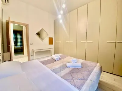 Letto o letti in una camera di Appartamento Centro Città